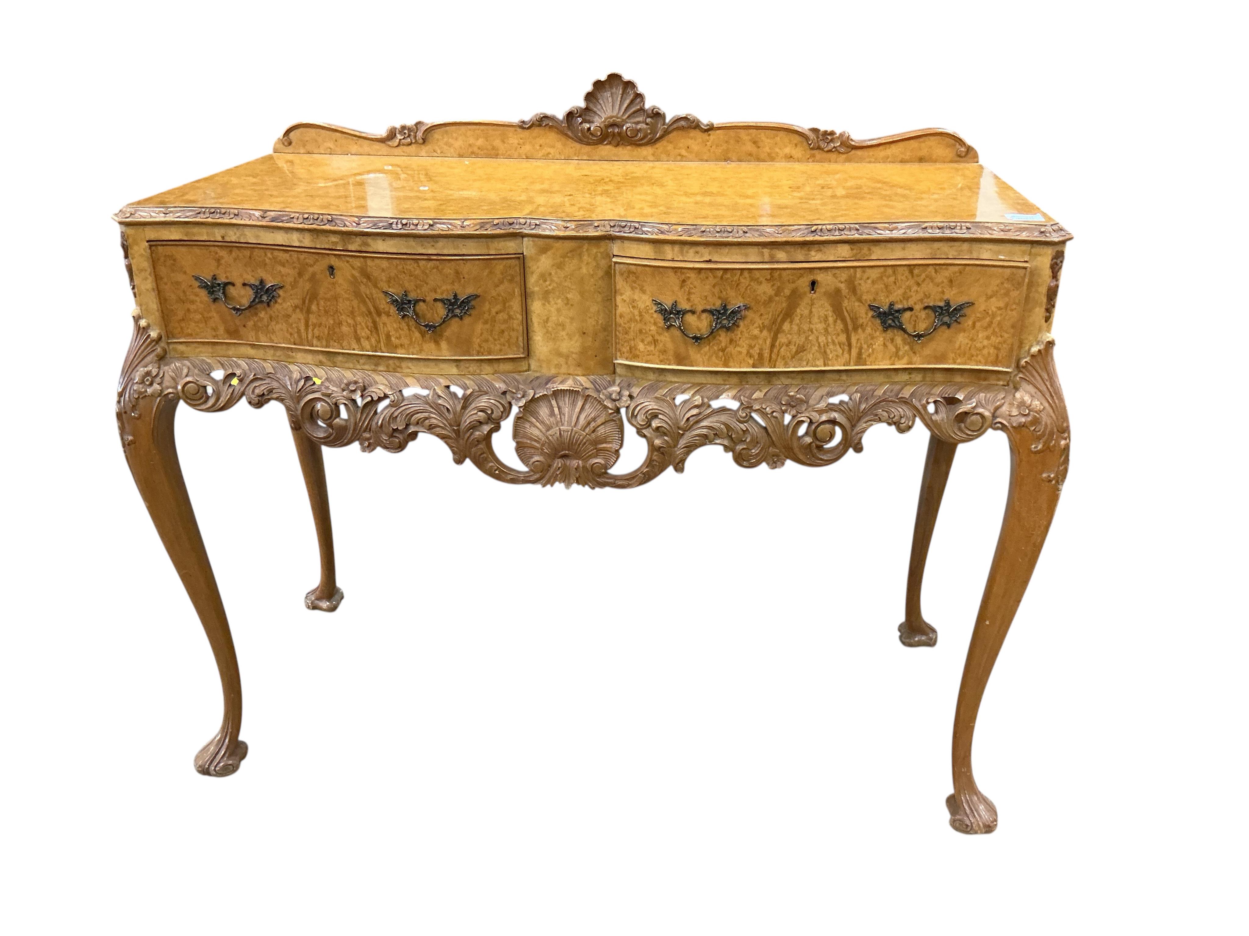 A Queen Anne Revival walnut two drawer serving table, width 120cm, depth 50cm, height 87cm